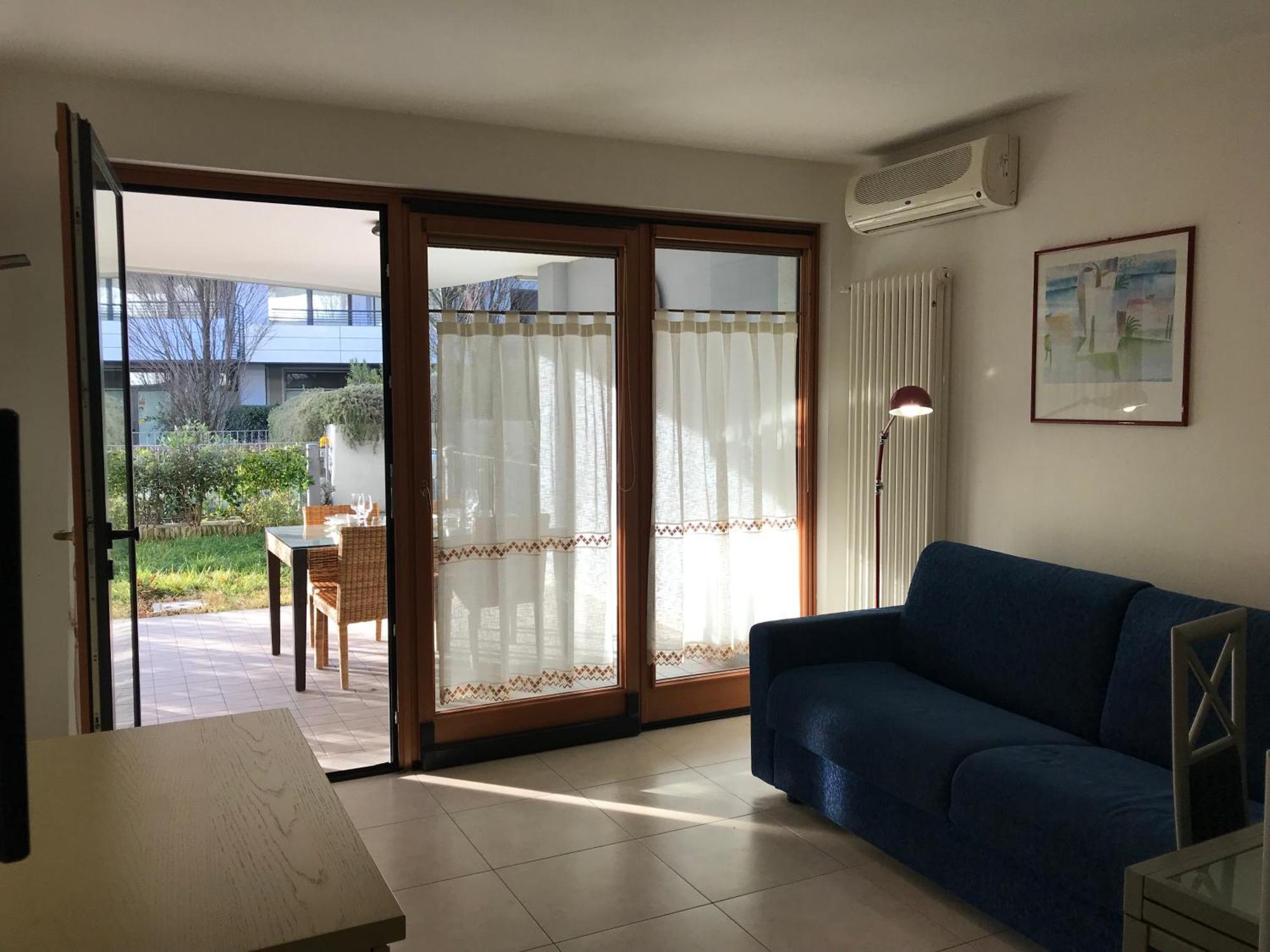 Costa Azzurra Apartment Градо Номер фото