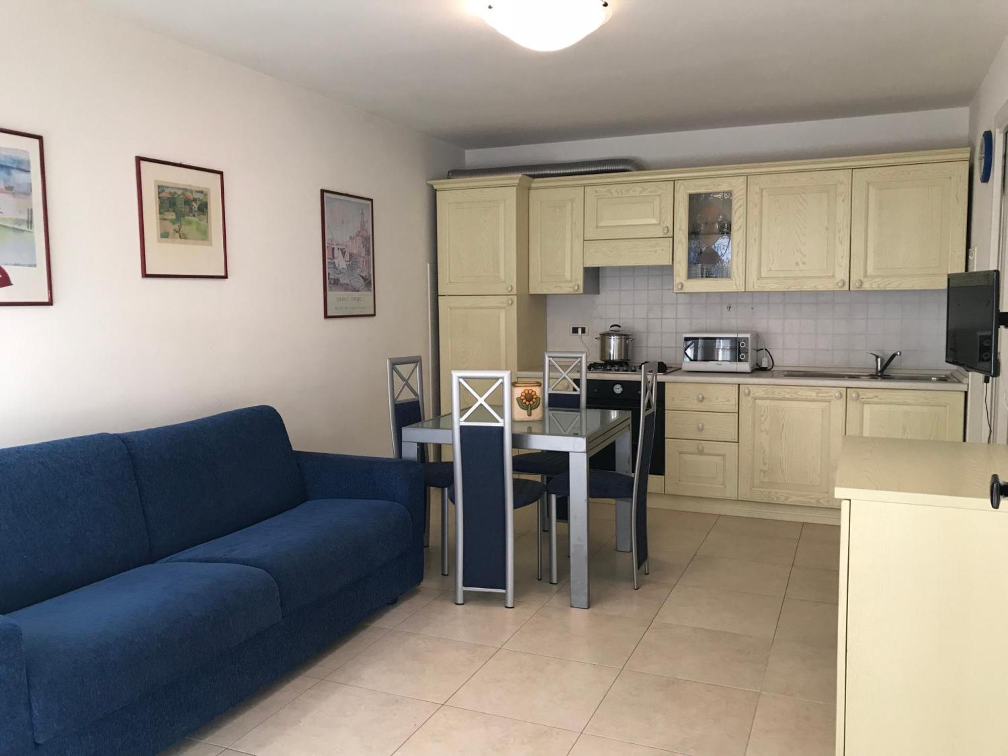 Costa Azzurra Apartment Градо Номер фото