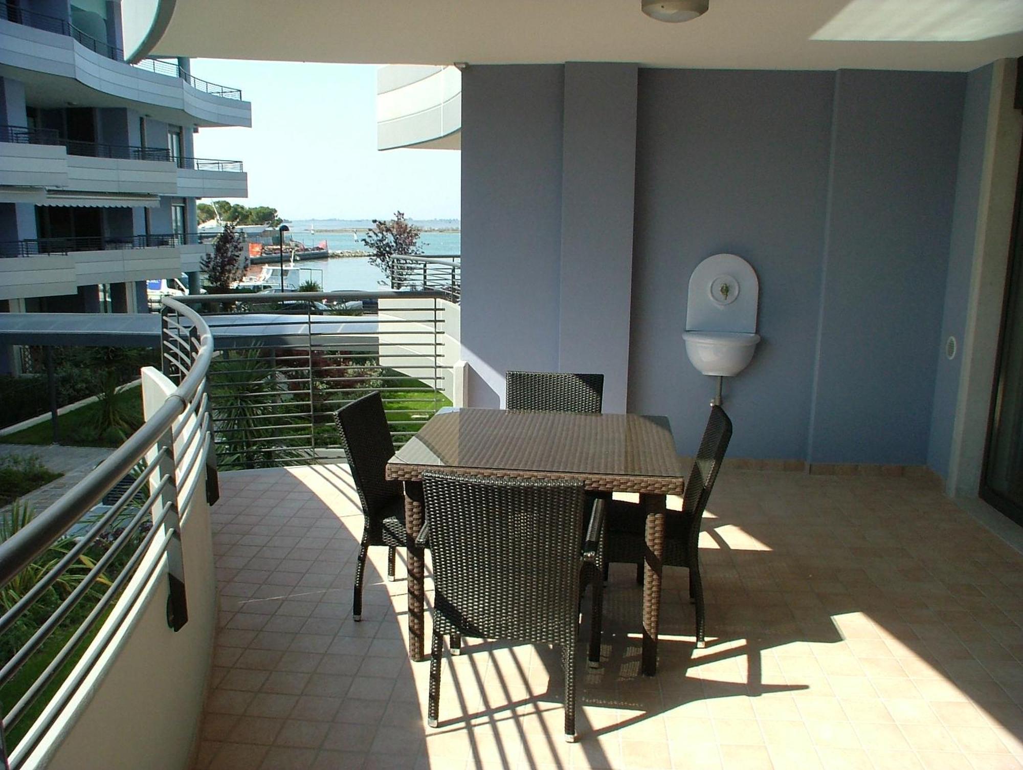 Costa Azzurra Apartment Градо Номер фото